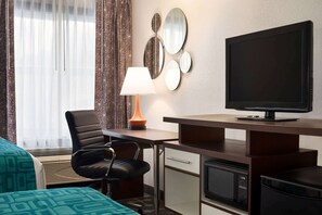 Desk, laptop workspace, blackout curtains, iron/ironing board