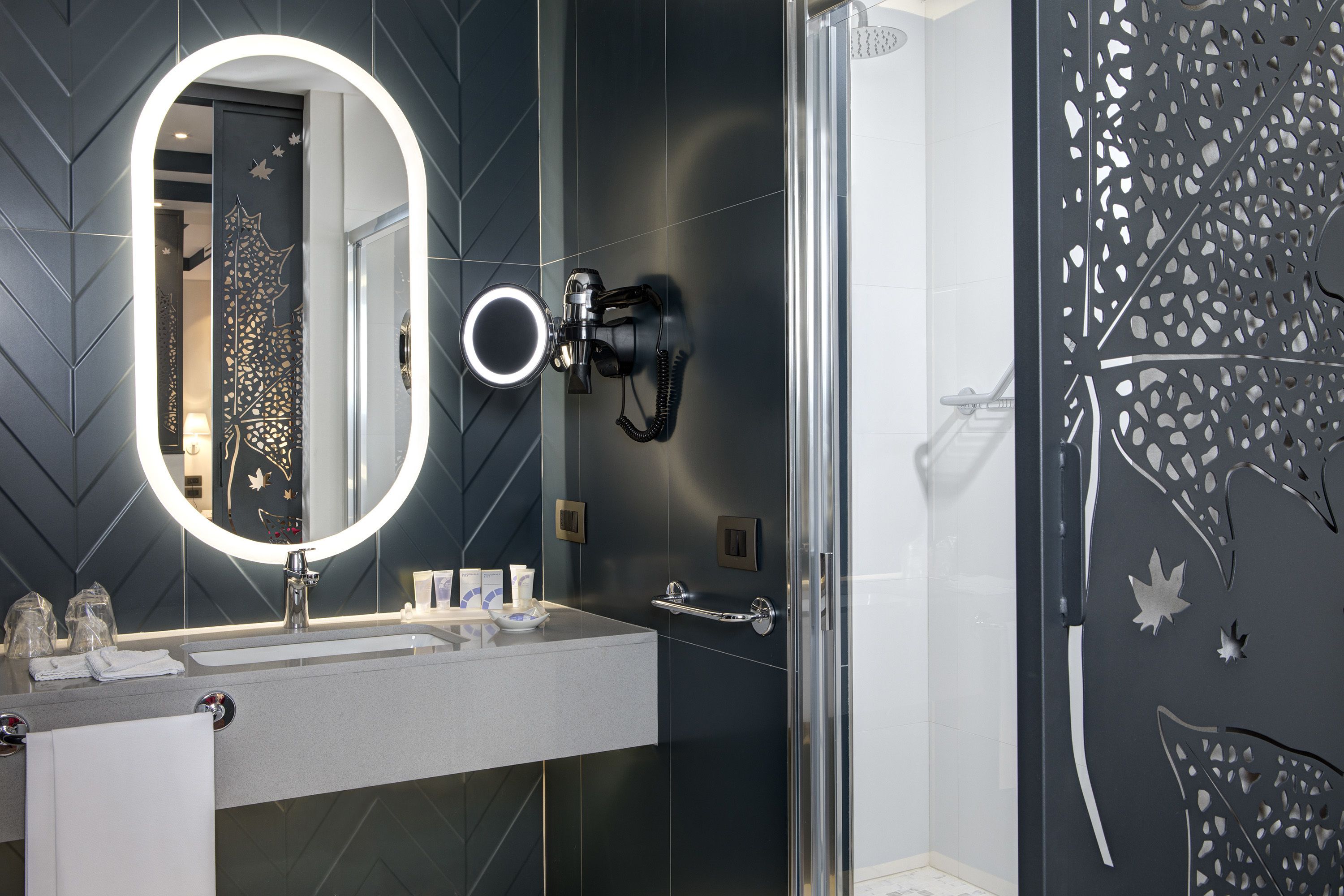 rainfall showerhead, eco-friendly toiletries, bidet, towels