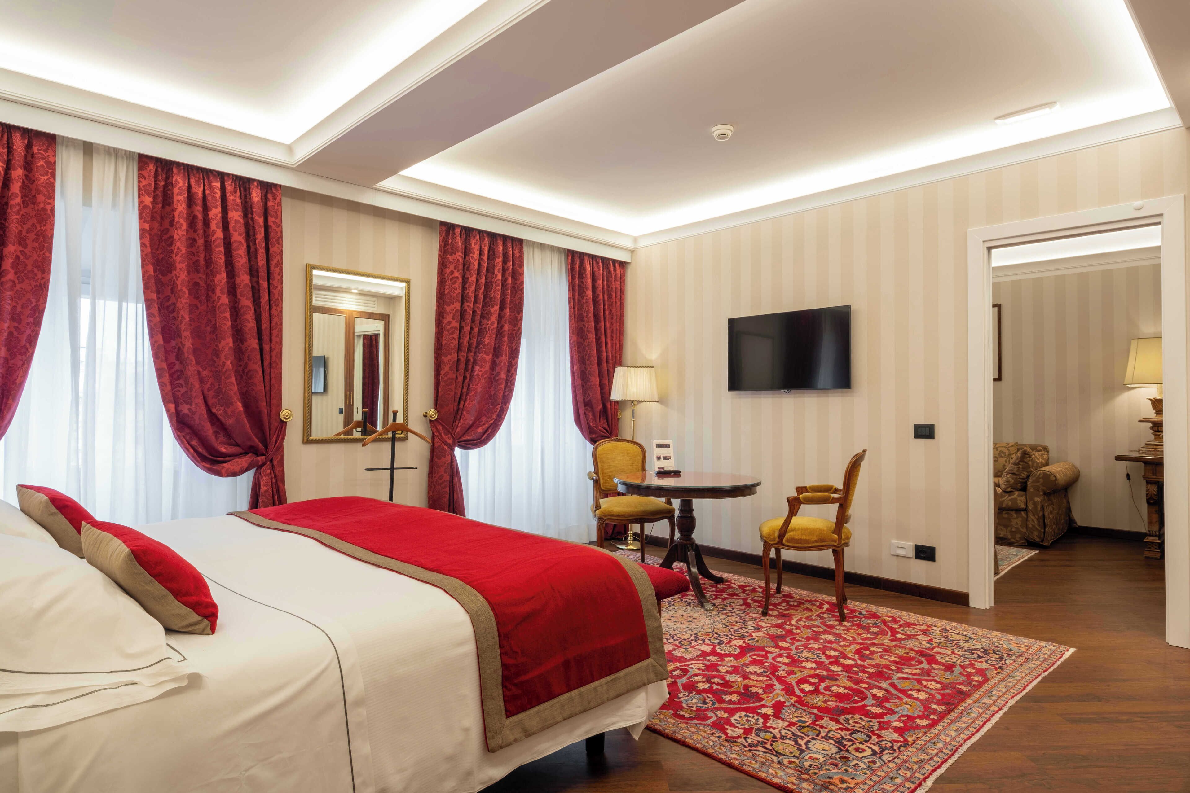 Junior studio suite | Italiaanse Frette-lakens, luxe beddengoed, donsdekens, een minibar