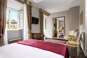 Chambre Deluxe double ou avec lits jumeaux, vue sur la ville | Draps italiens de Frette, literie de qualité, couette en duvet, minibar