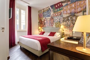 Frette Italian sheets, premium bedding, down comforters, minibar