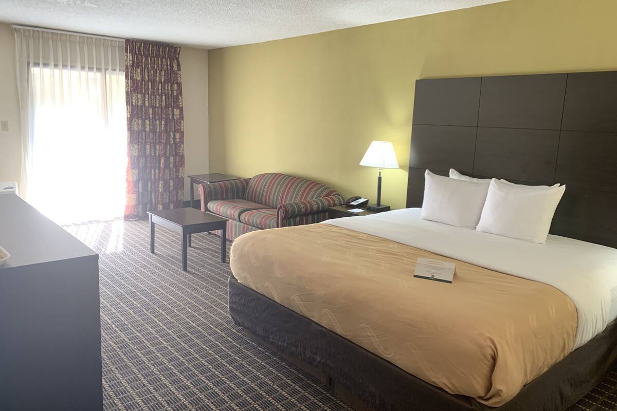 suite, 1 king bed with sofa bed | desk, blackout curtains, iron/ironing board, free cots/infant beds