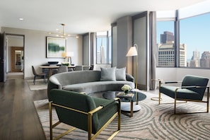 Suite Luxe, 1 chambre | Salle de séjour | Télévision LCD de 37 pouces avec chaînes par câble, télévision, Netflix