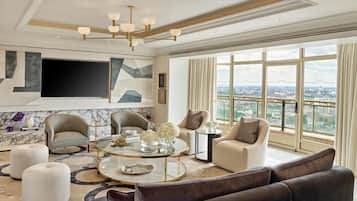 Presidential Suite | Living area | 50-inch plasma TV with satellite channels, Smart TV, DVD player