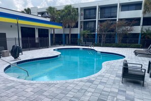 Outdoor pool, open 8:00 AM to 10:00 PM, sun loungers