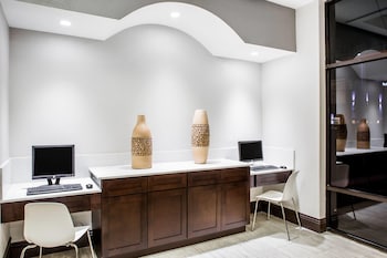 Business center at Days Inn & Suites by Wyndham Orlando Airport