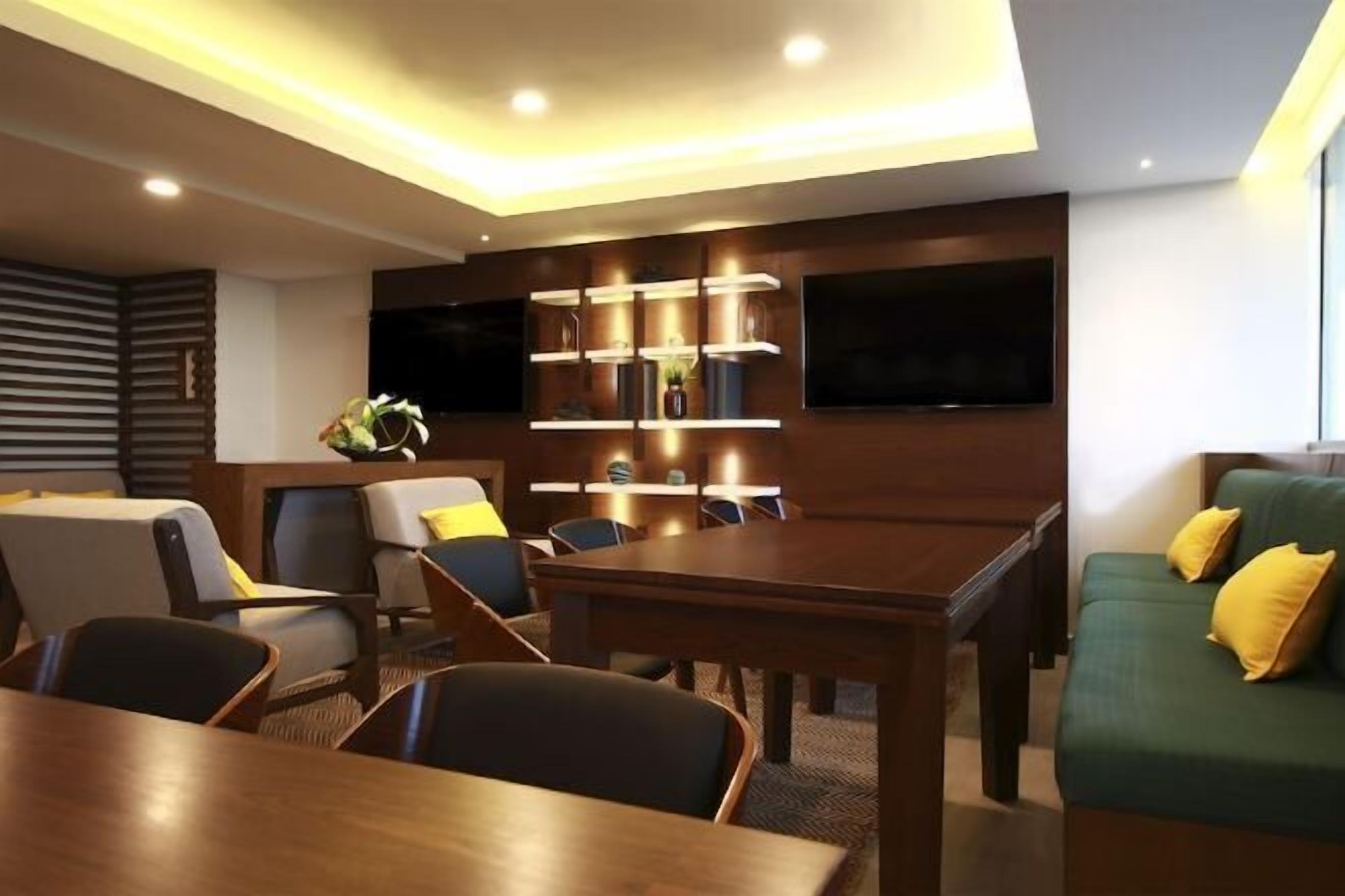 Lunch, dinner served; international cuisine, pool views 