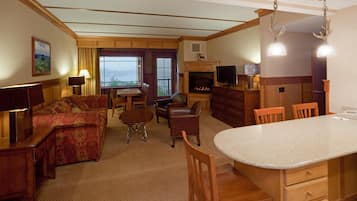 Premium Suite, 1 King Bed with Sofa bed, Kitchenette, Mountain View | Living area | 32-inch TV with cable channels