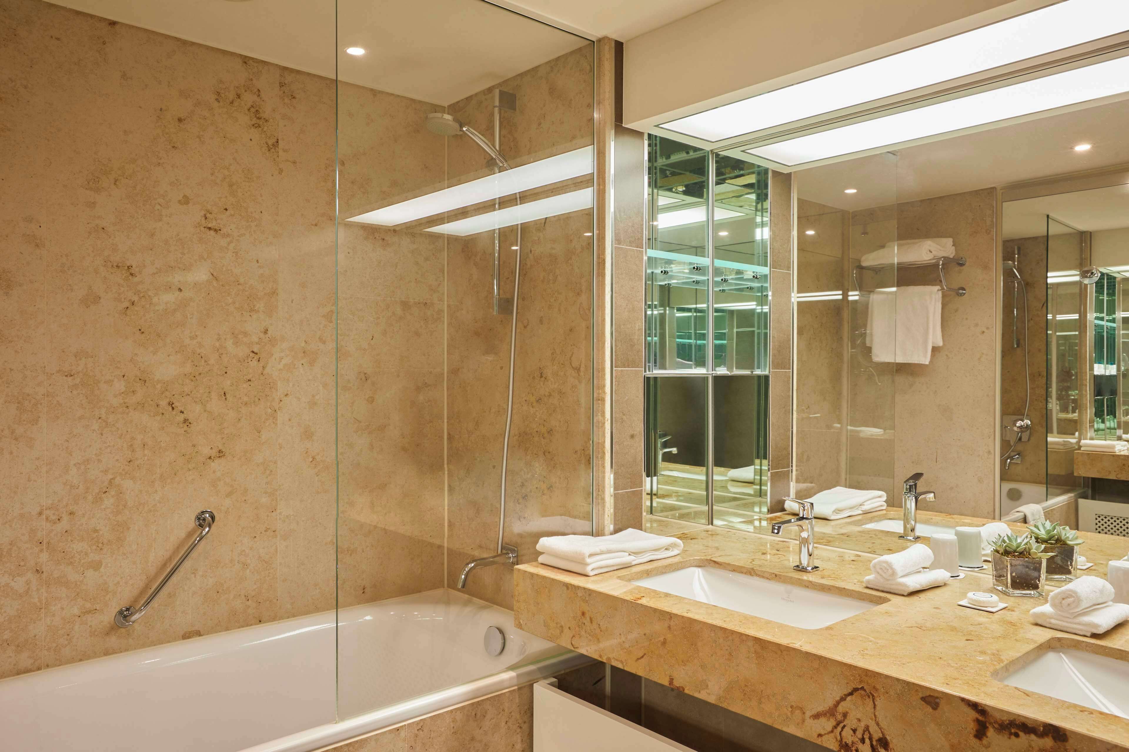 eco-friendly toiletries, hair dryer, bathrobes, slippers