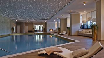Indoor pool, seasonal outdoor pool, pool umbrellas, pool loungers