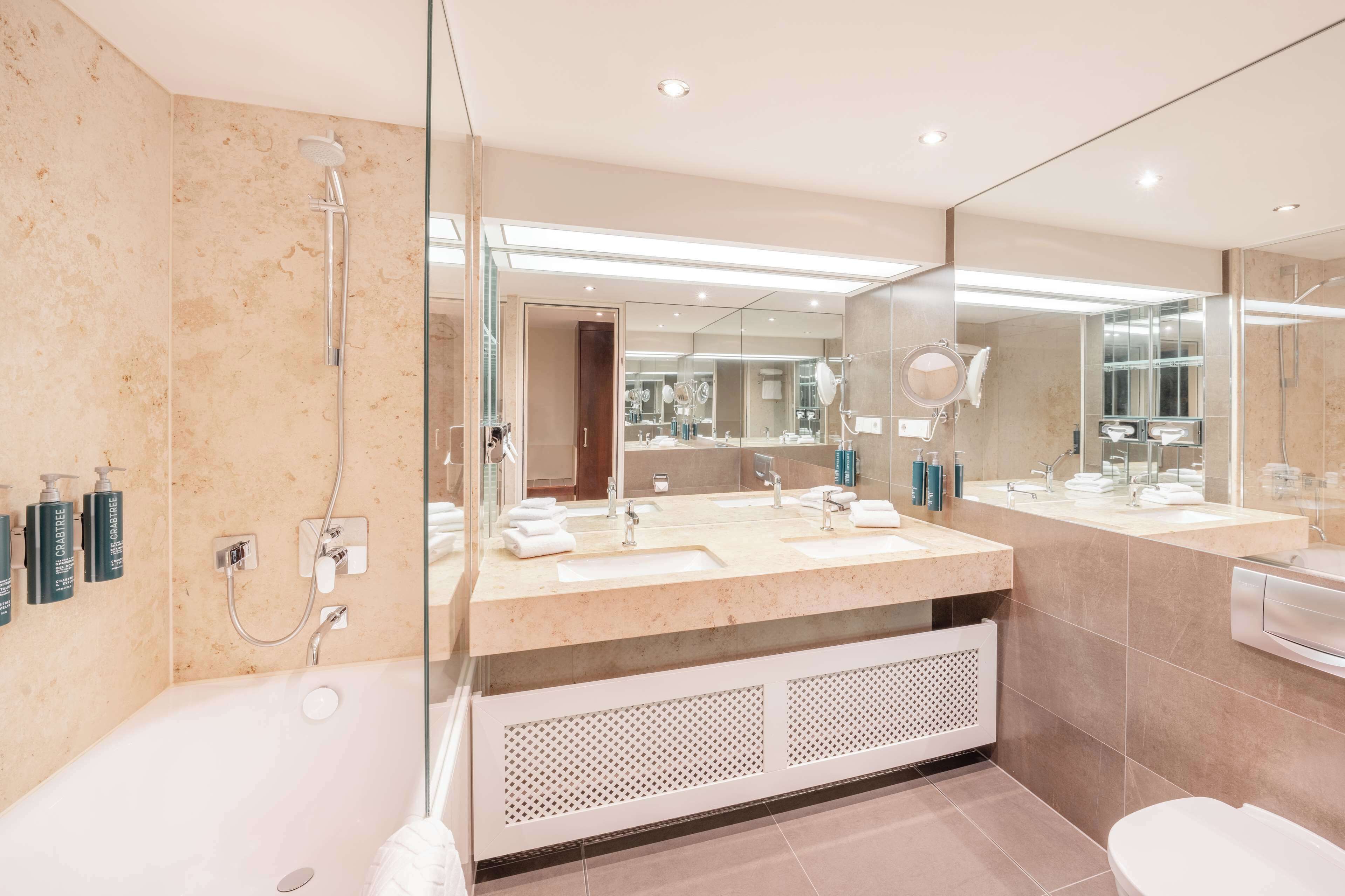 eco-friendly toiletries, hair dryer, bathrobes, slippers