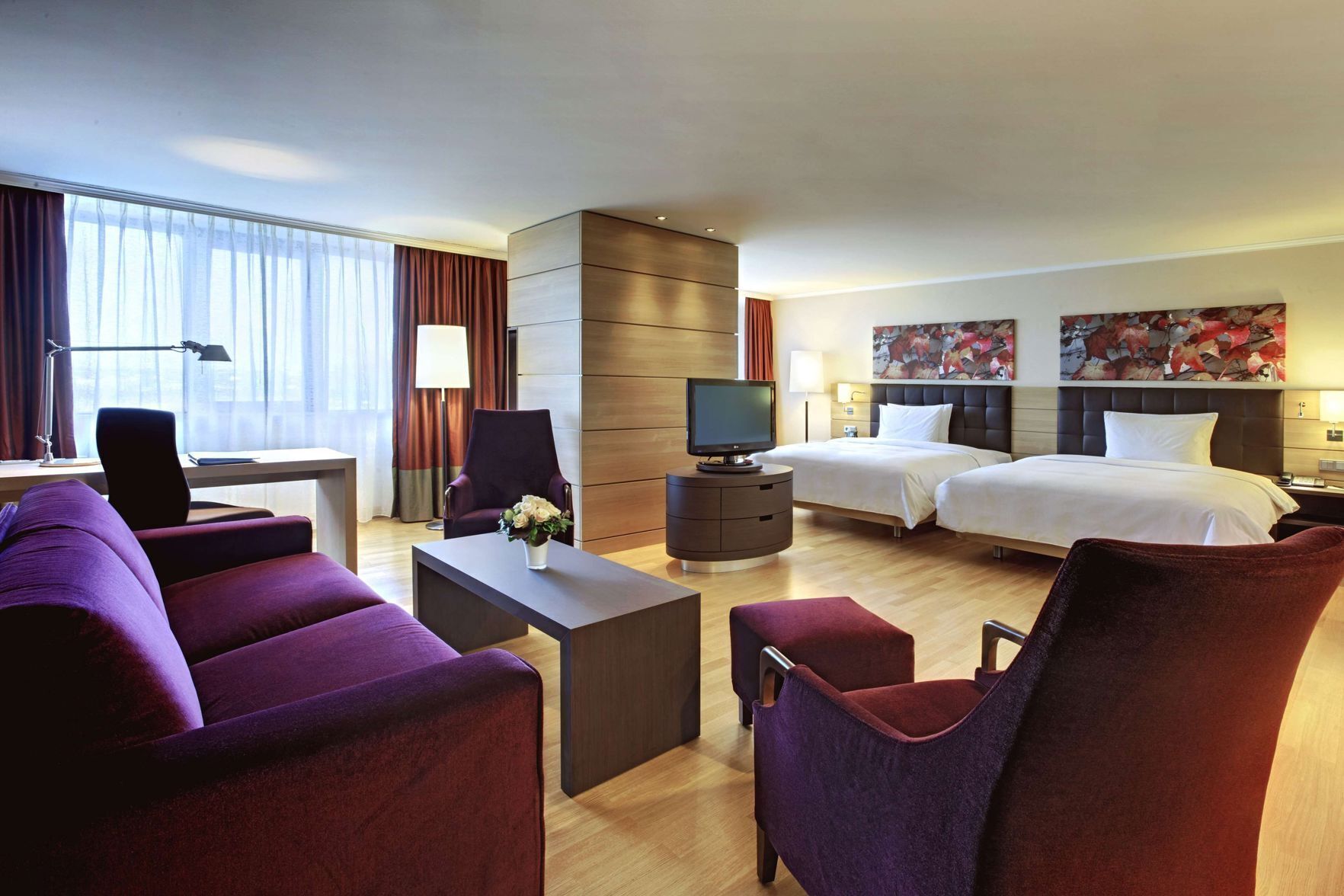 Premium bedding, down comforters, minibar, in-room safe