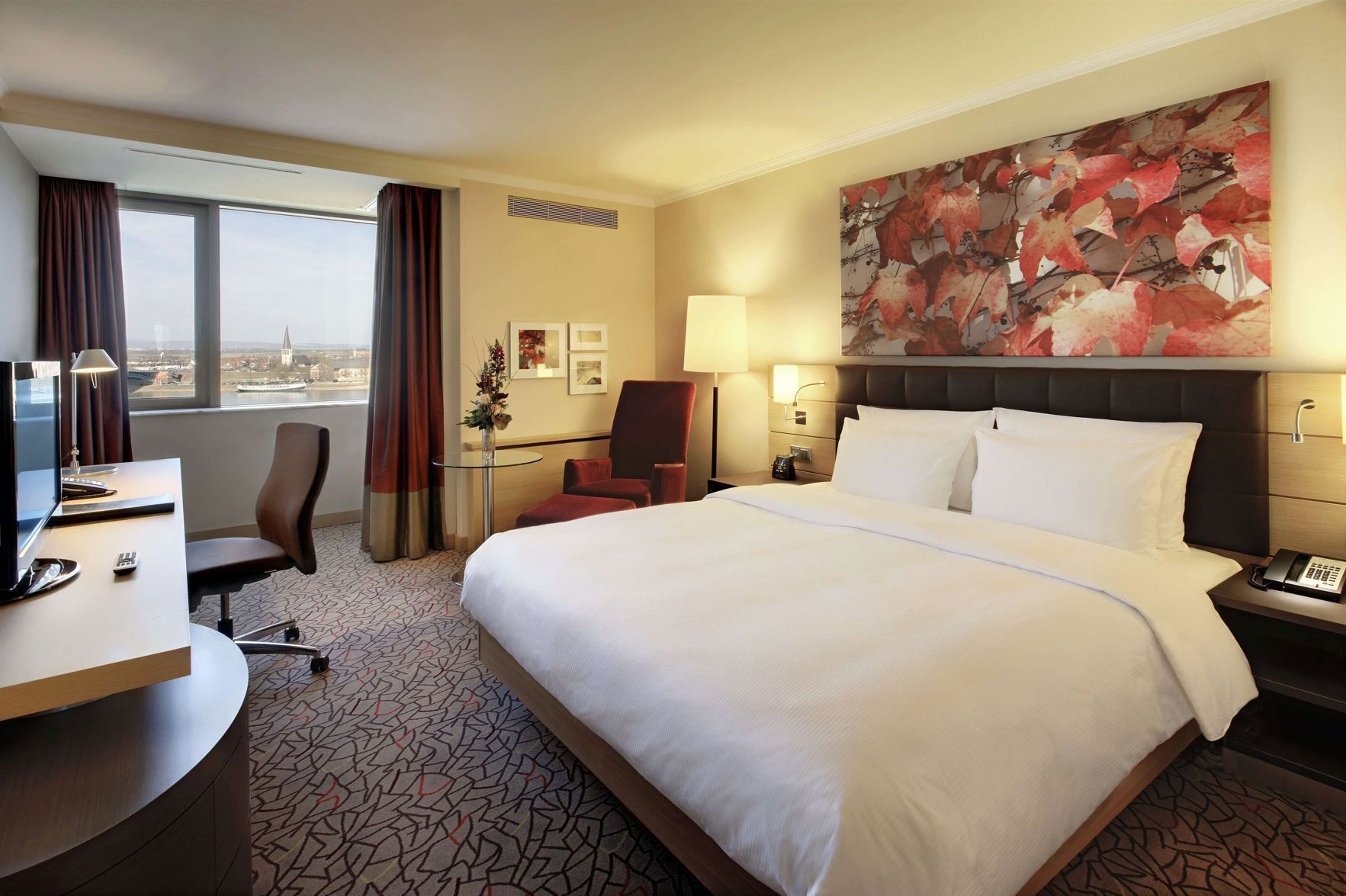 Premium bedding, down comforters, minibar, in-room safe