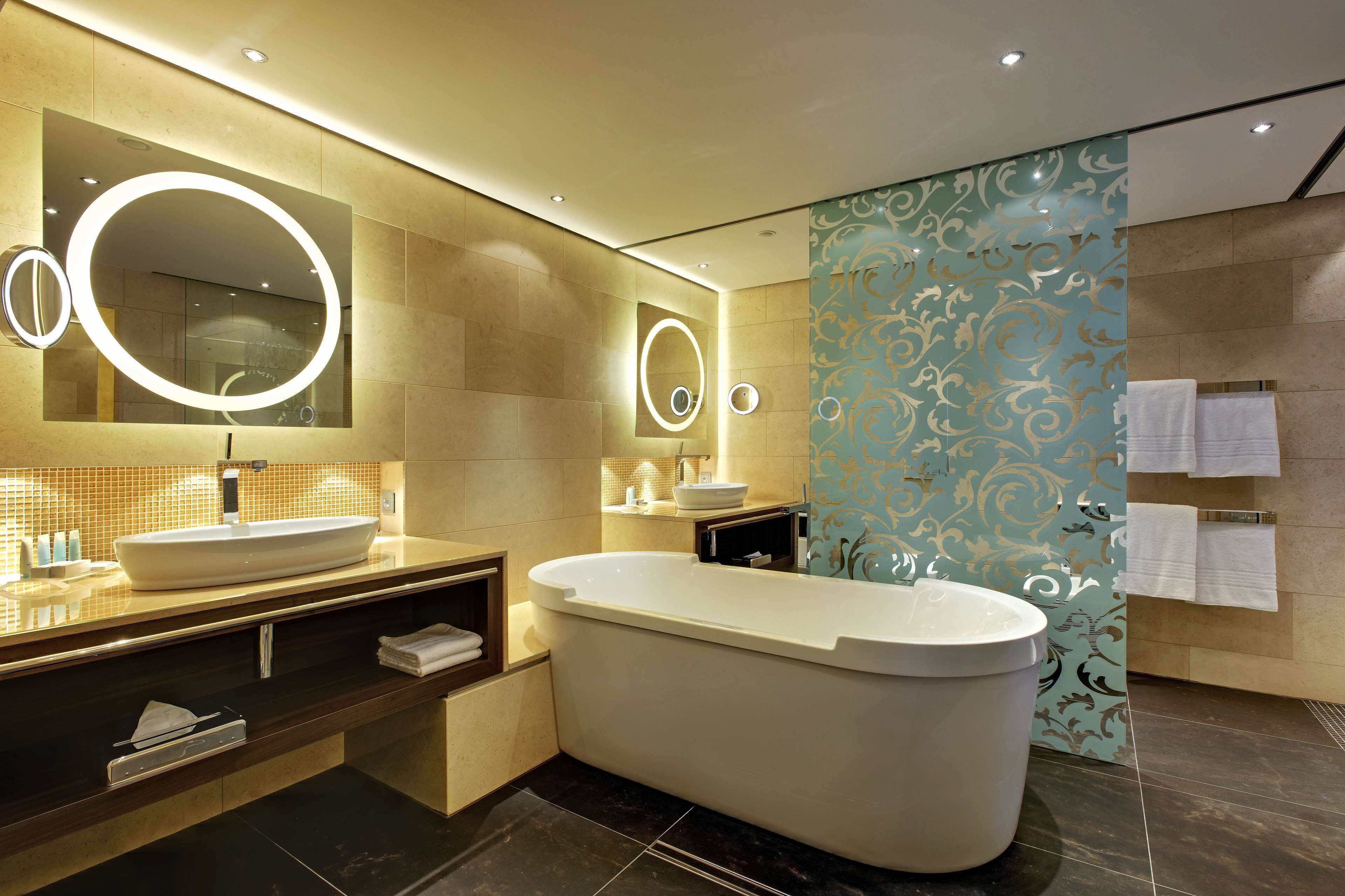 presidential suite | bathroom | combined shower/bathtub, designer toiletries, hair dryer, slippers