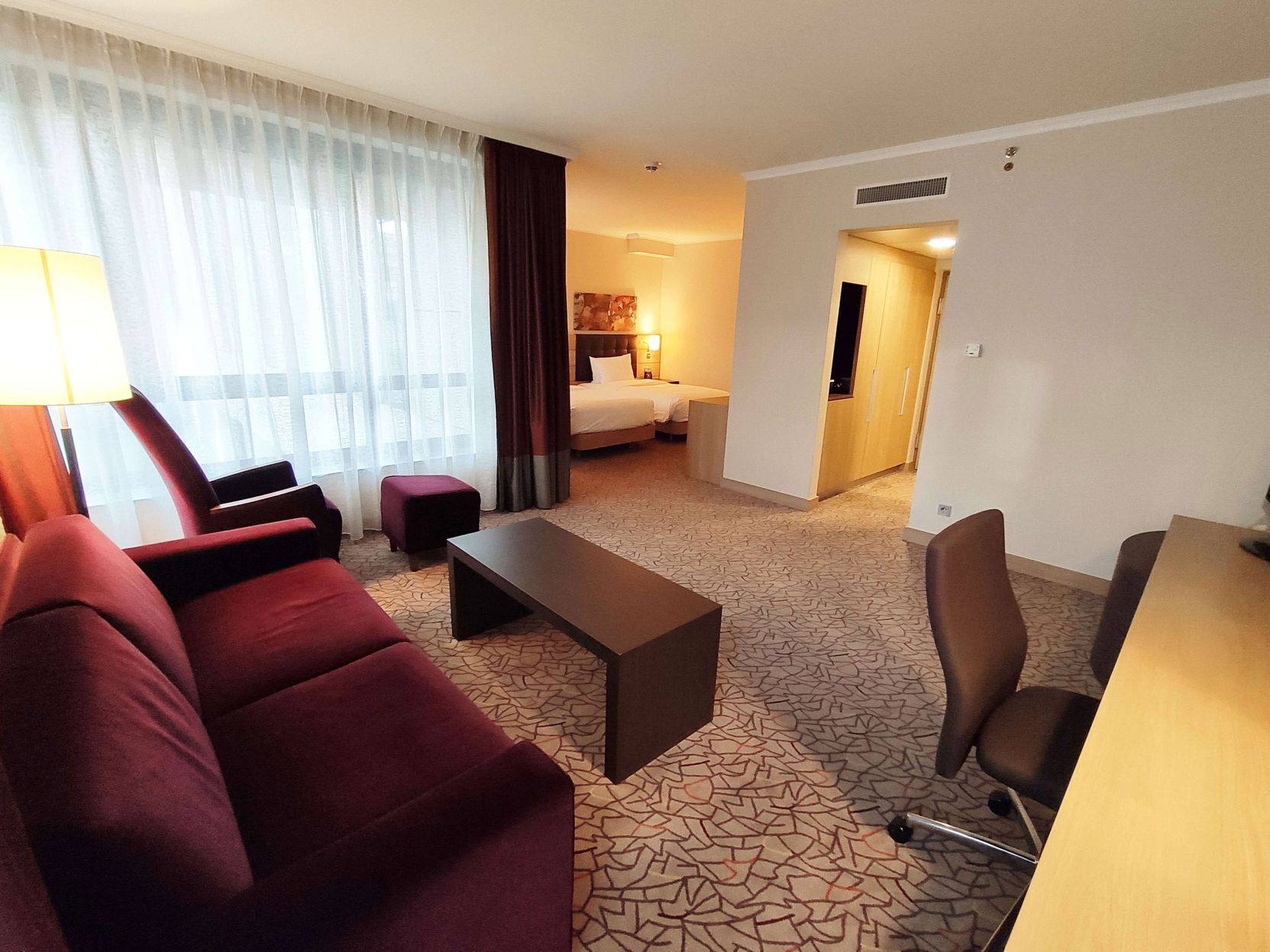 Premium bedding, down comforters, minibar, in-room safe