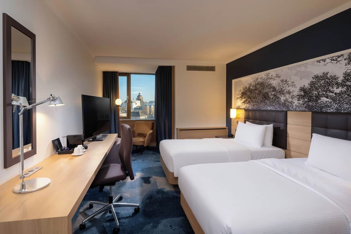 Premium bedding, down comforters, minibar, in-room safe