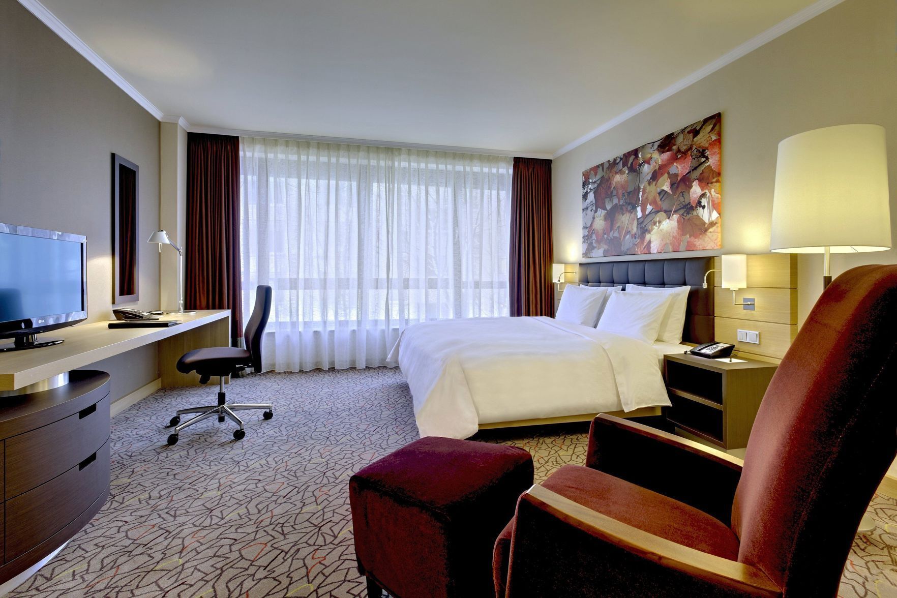 Premium bedding, down comforters, minibar, in-room safe