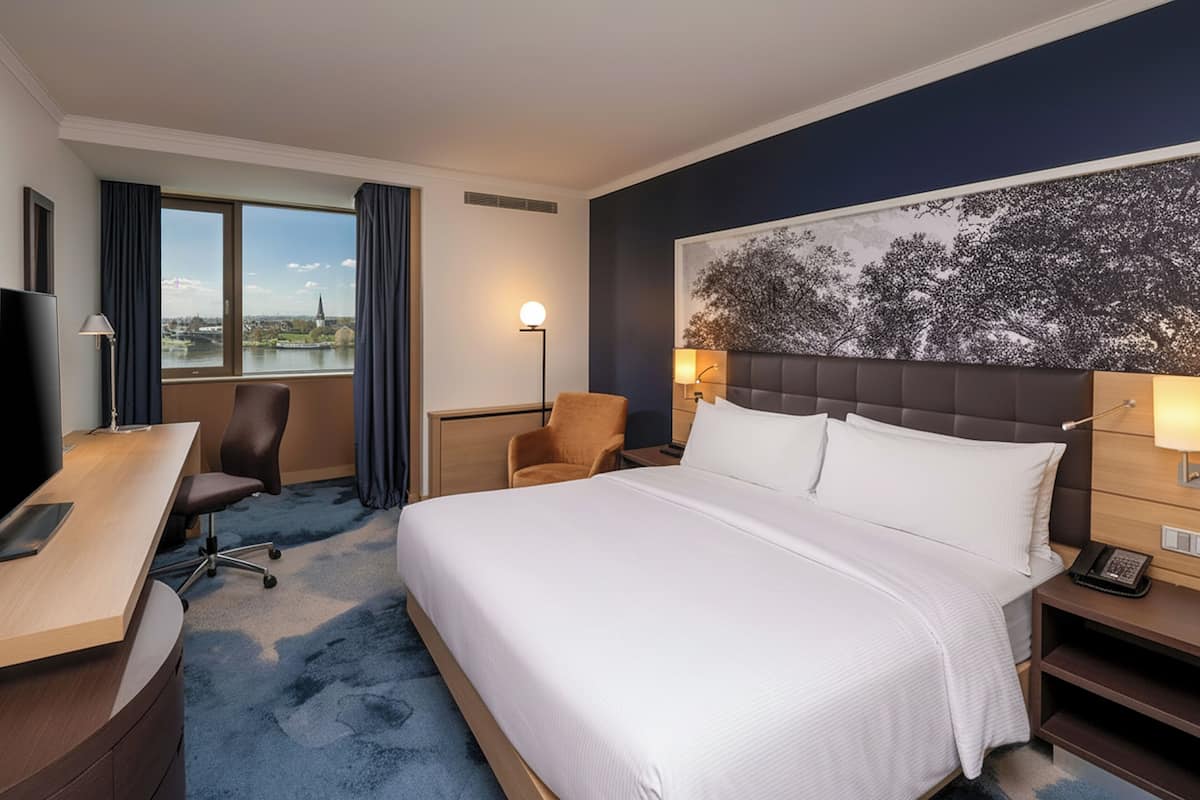 Ropa de cama de alta calidad, edredones de plumas, minibar y caja fuerte