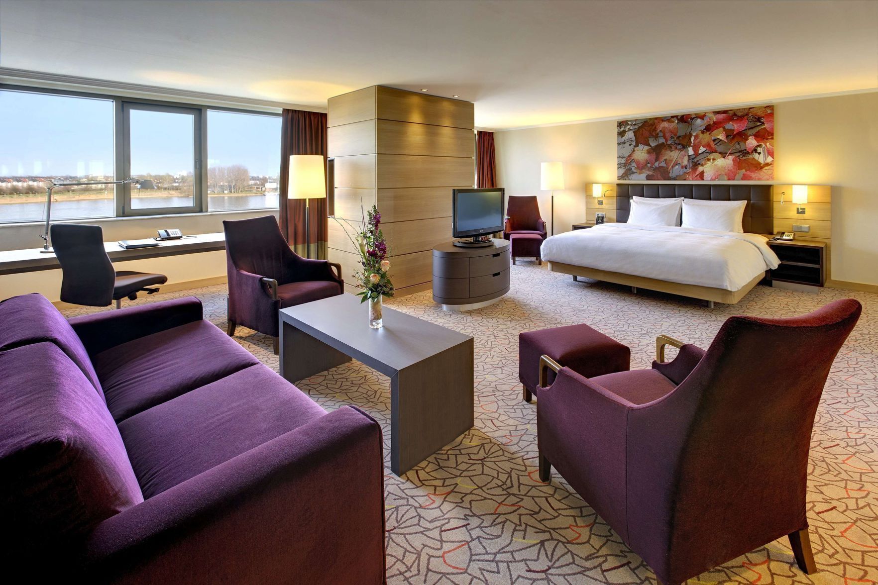 Premium bedding, down comforters, minibar, in-room safe