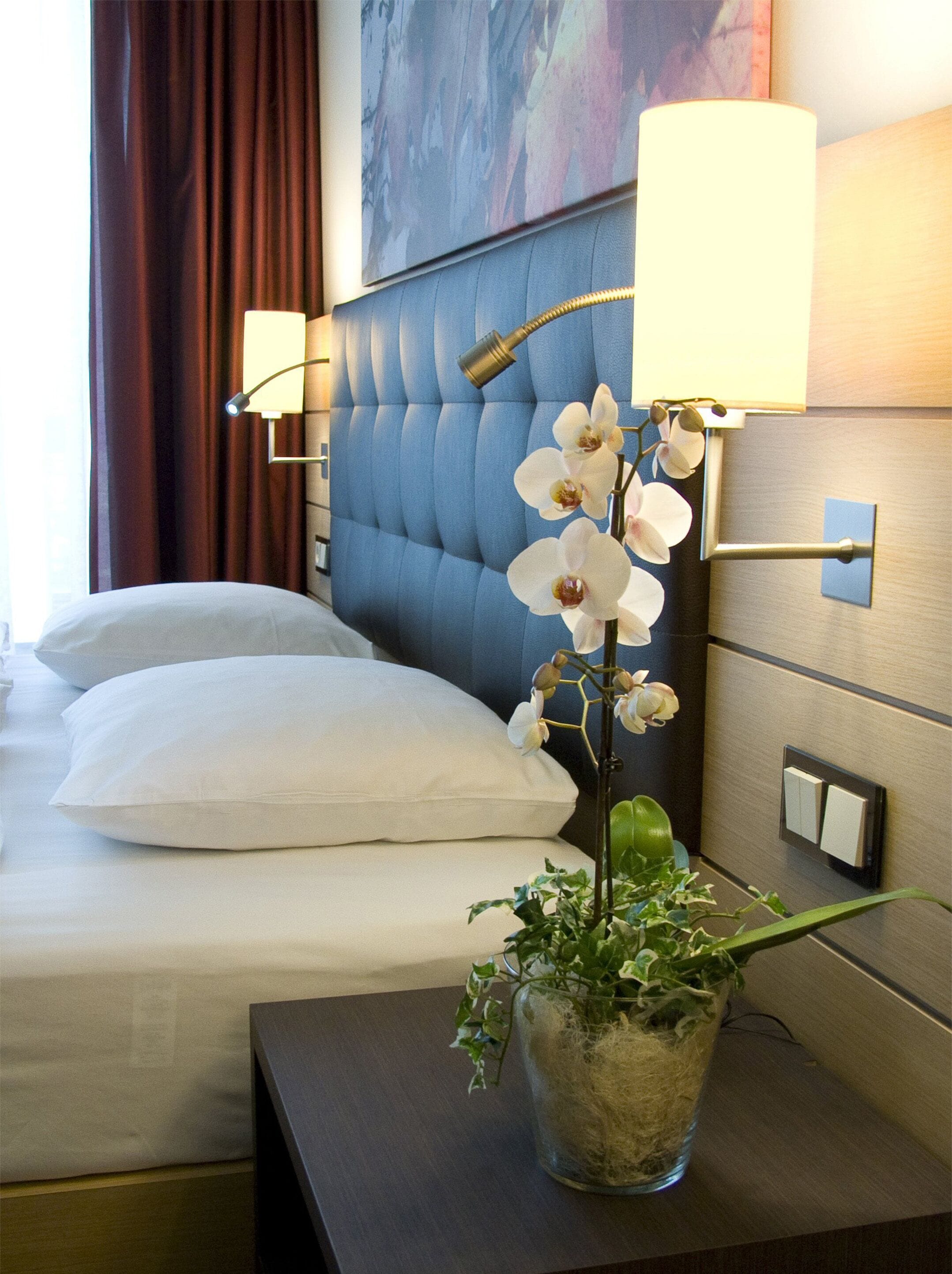 premium bedding, down duvets, minibar, in-room safe