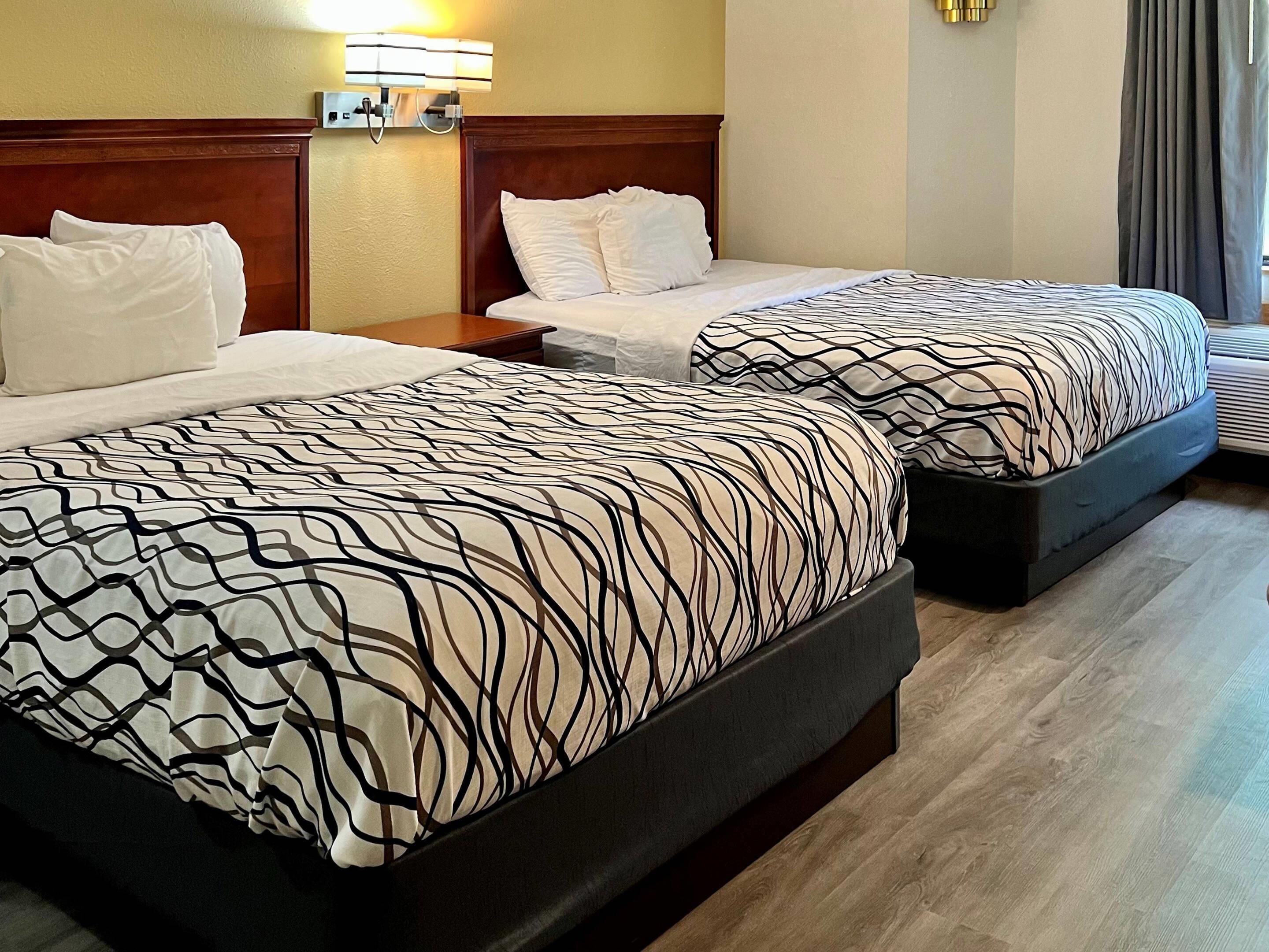 Pillow-top beds, desk, laptop workspace, iron/ironing board