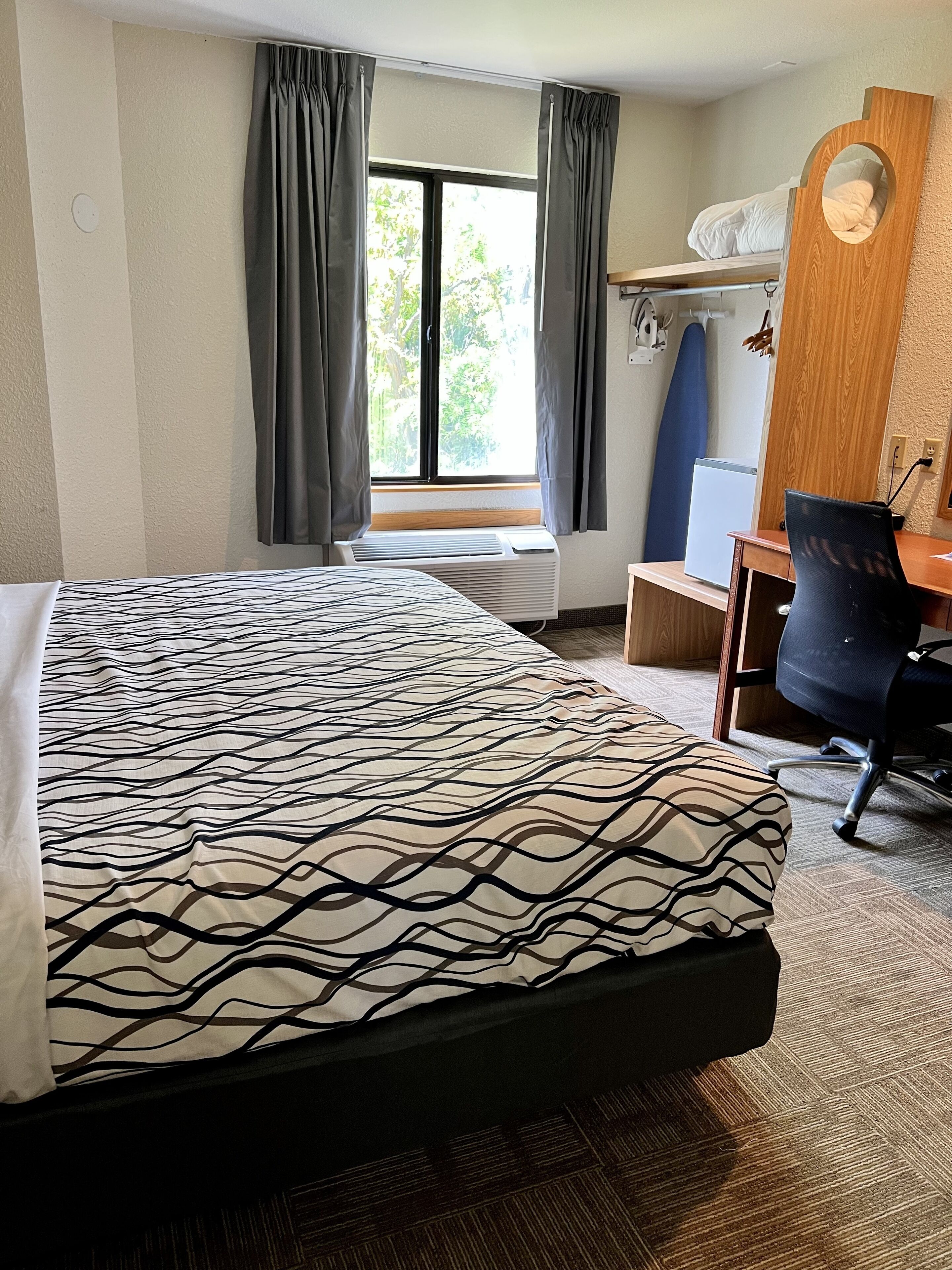 pillow-top beds, desk, laptop workspace, iron/ironing board