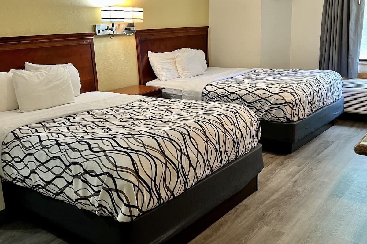 standard room, 2 queen beds, non smoking | pillow-top beds, desk, laptop workspace, iron/ironing board