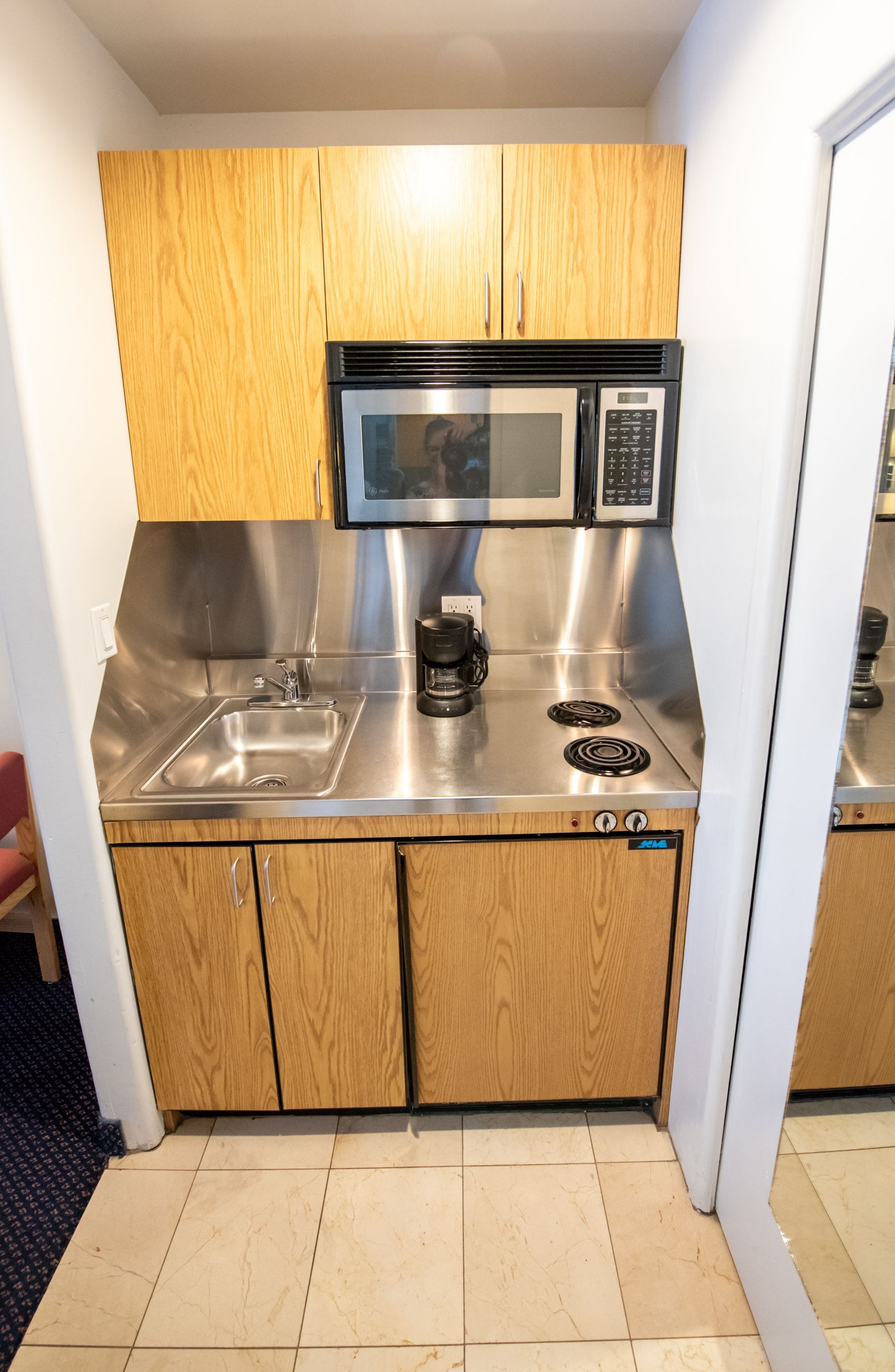 standard room, 2 queen beds, kitchenette, pool view | 1 bedroom, premium bedding, pillow-top beds, iron/ironing board