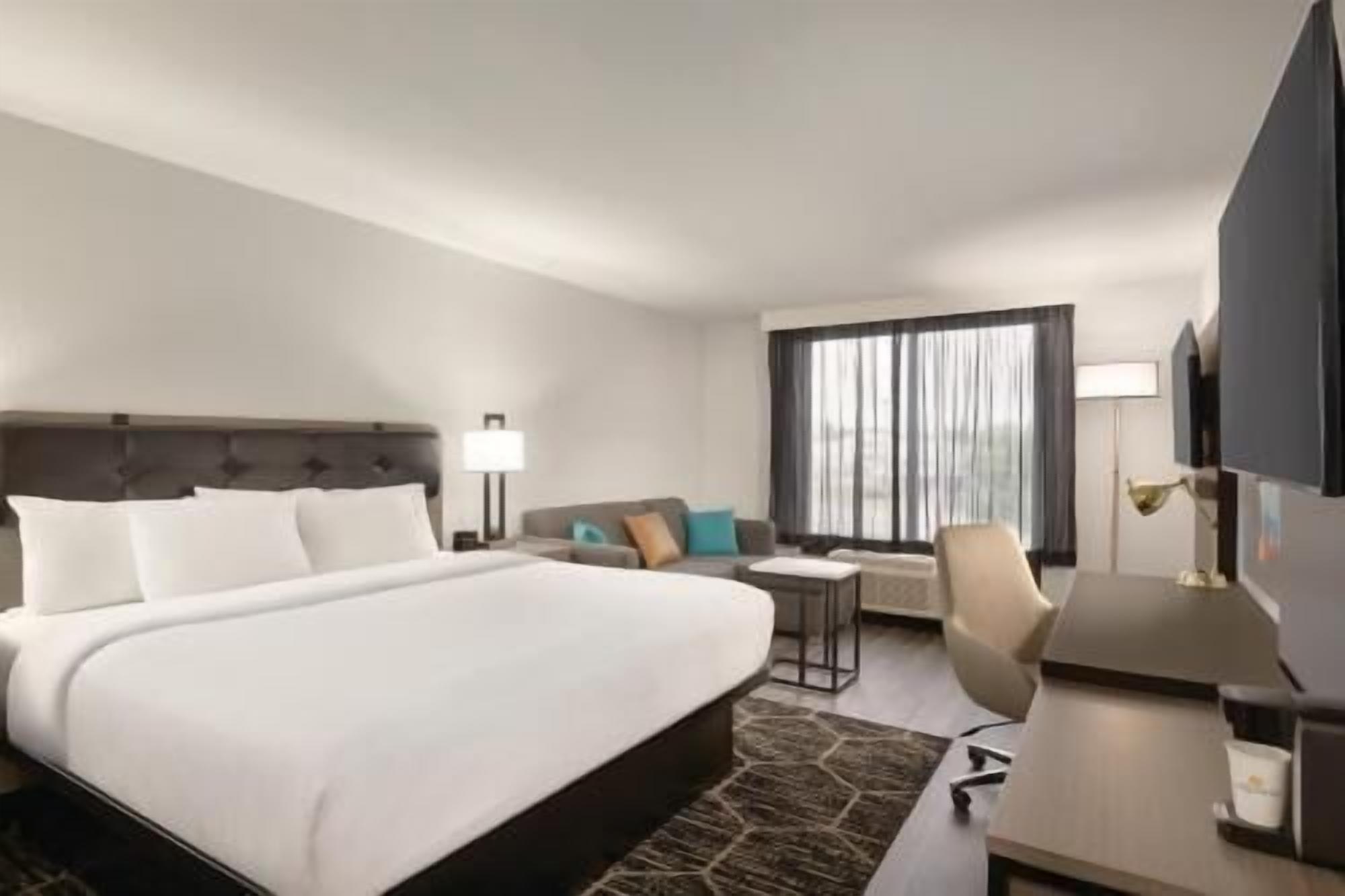 Premium bedding, desk, blackout drapes, iron/ironing board