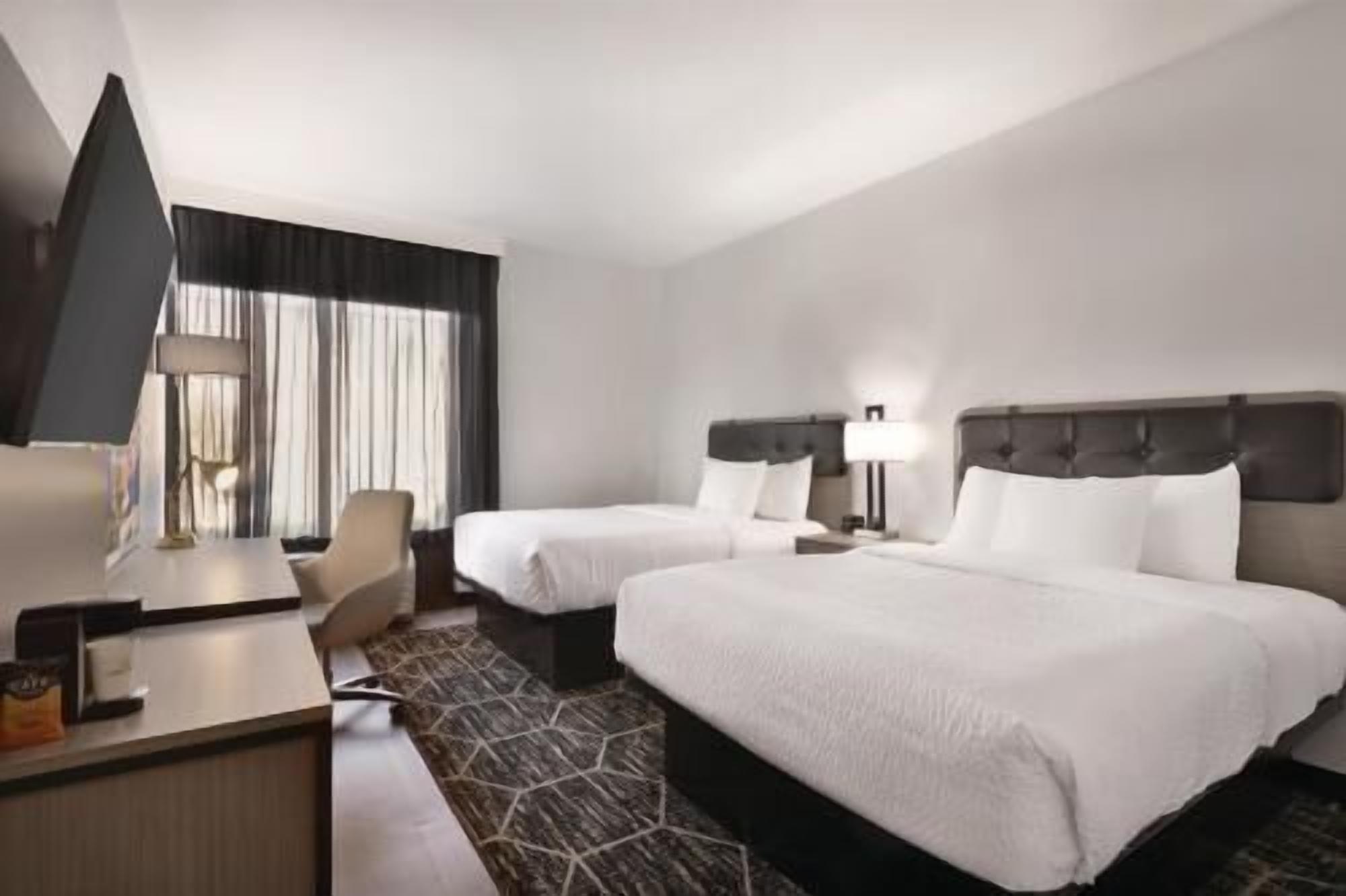 Premium bedding, desk, blackout drapes, iron/ironing board