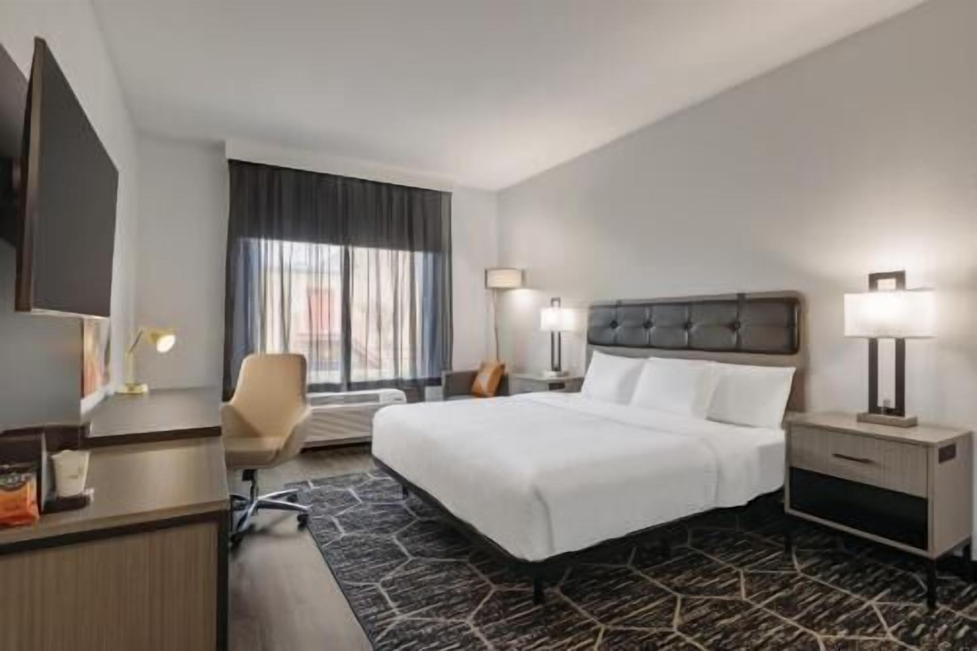 Premium bedding, desk, blackout drapes, iron/ironing board