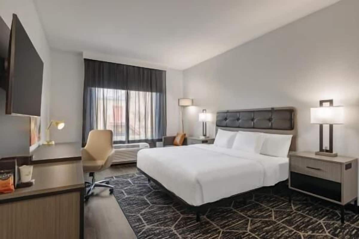 Premium bedding, desk, blackout curtains, iron/ironing board