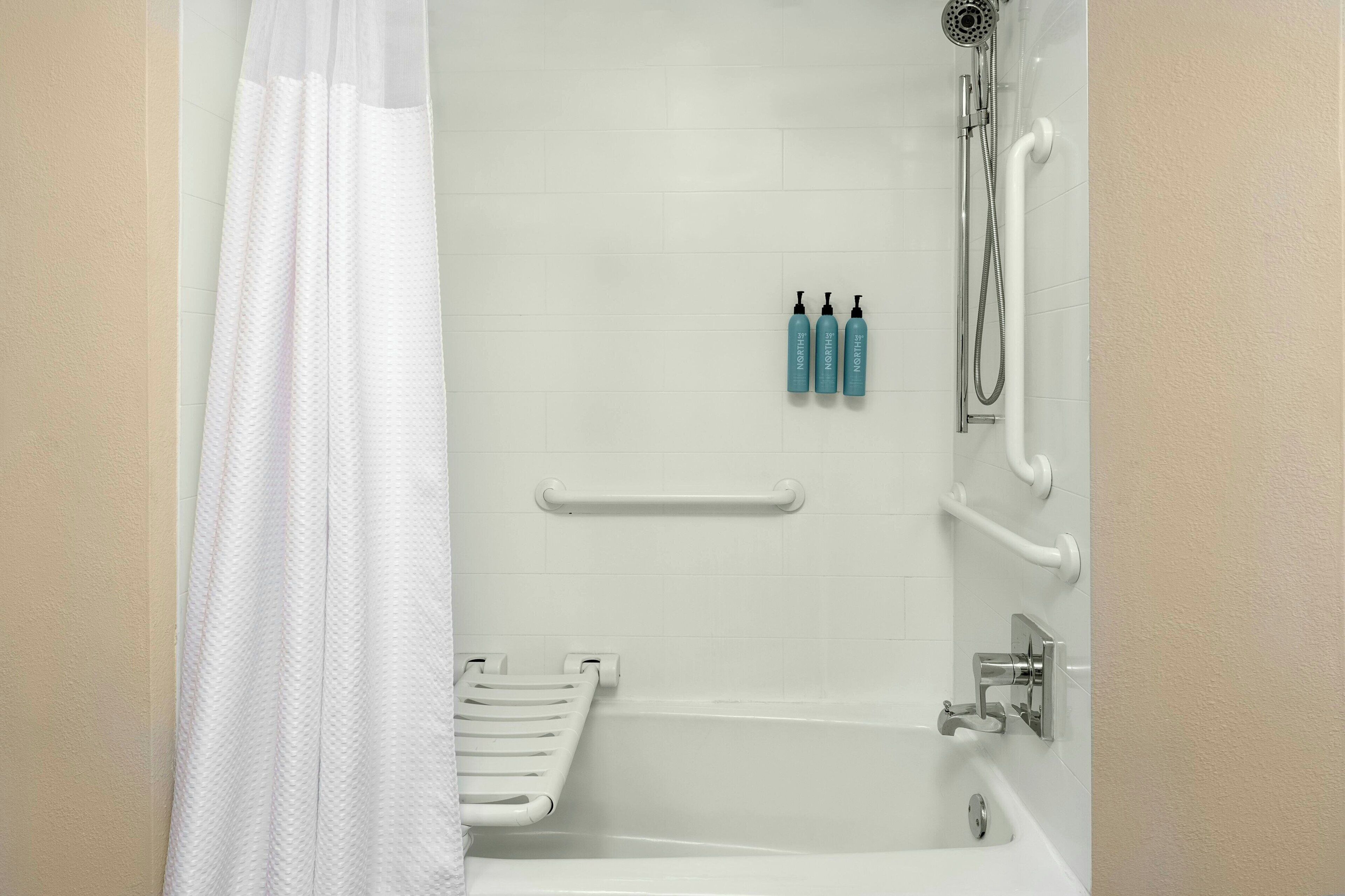 combined shower/bathtub, free toiletries, hair dryer, towels