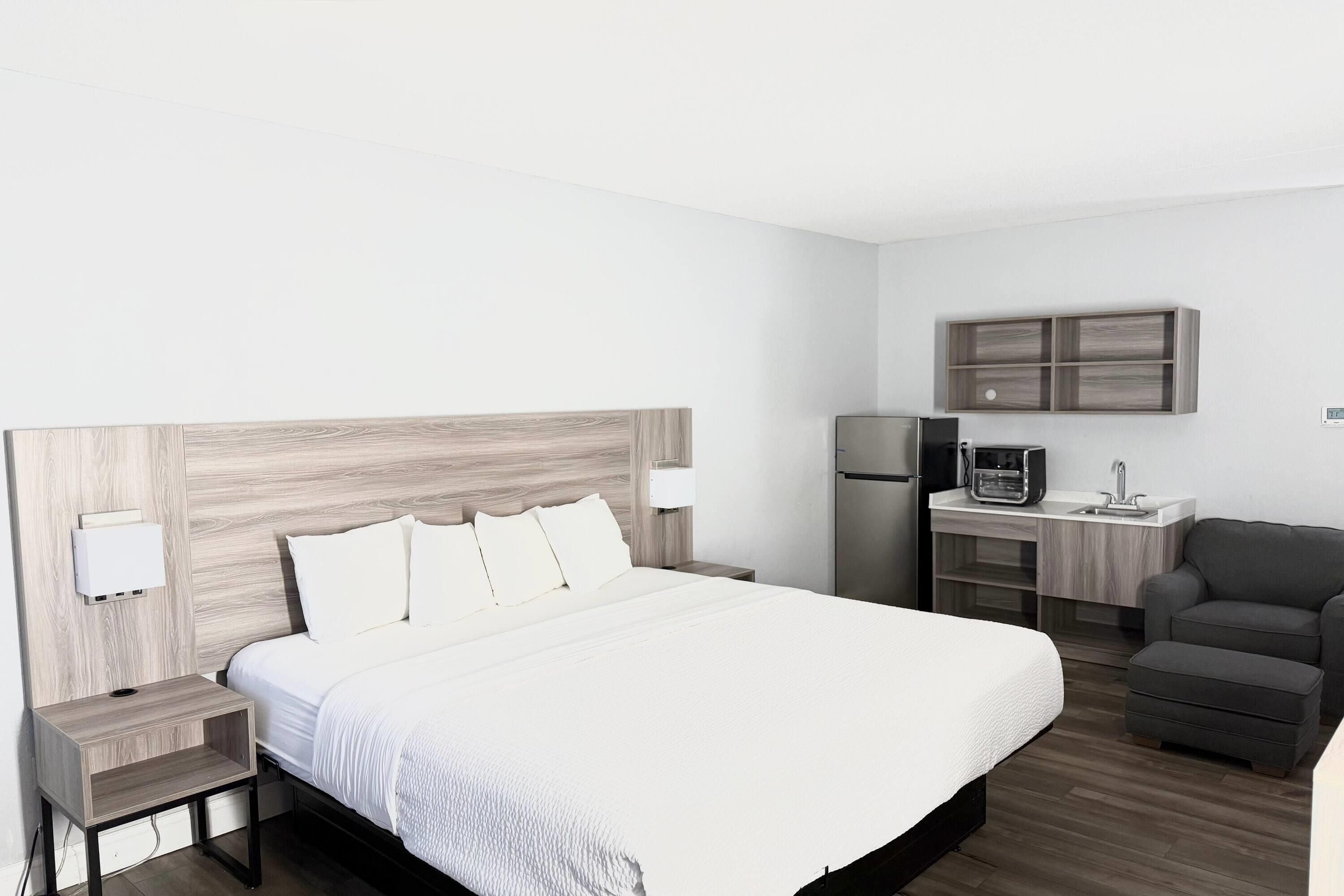 Suite, 1 King Bed, Non Smoking, Kitchenette | Pillowtop beds, desk, laptop workspace, iron/ironing board