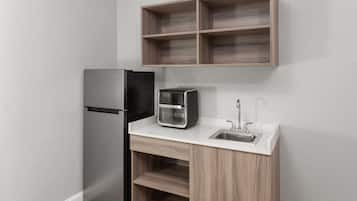 Suite, 1 King Bed, Non Smoking, Kitchenette | Pillowtop beds, desk, laptop workspace, iron/ironing board