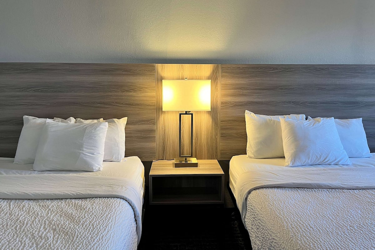 Pillow-top beds, desk, laptop workspace, iron/ironing board