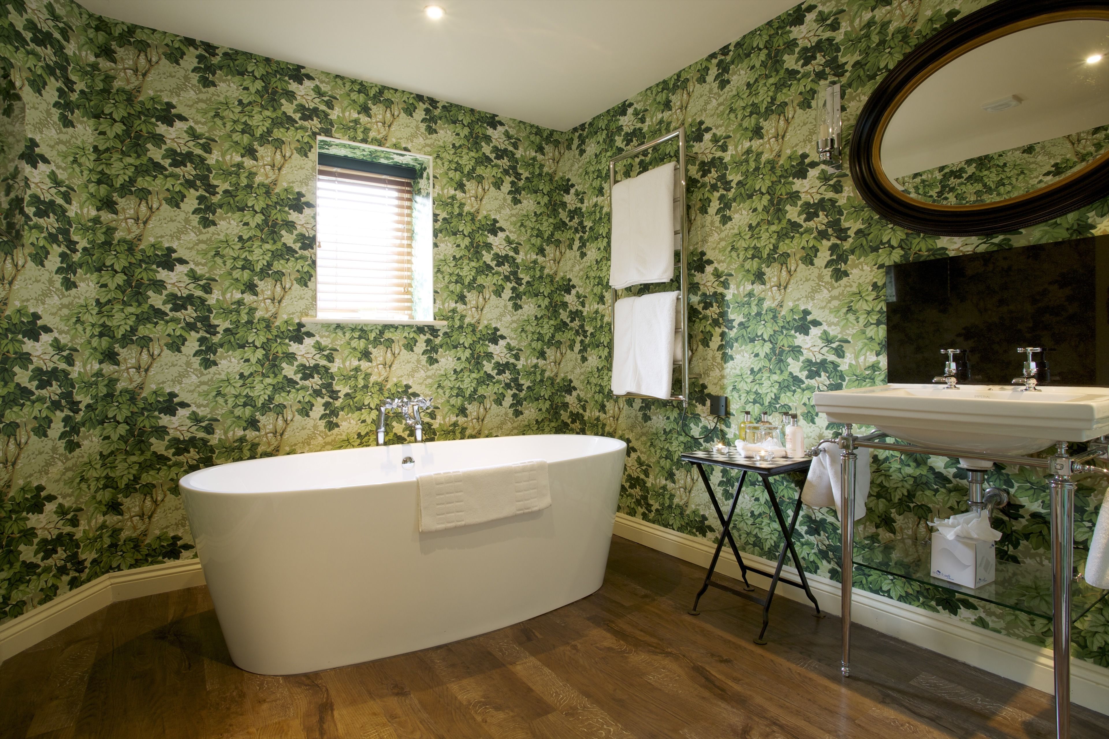 deluxe cottage | bathroom | free toiletries, hair dryer, slippers, towels