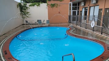 Seasonal outdoor pool, open 8:00 AM to 8:00 PM, sun loungers