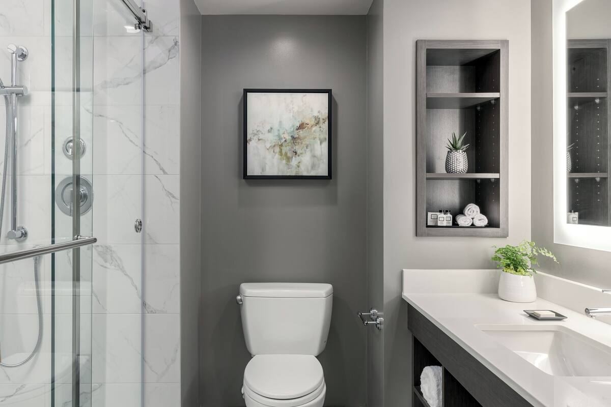 shower, designer toiletries, hair dryer, bathrobes