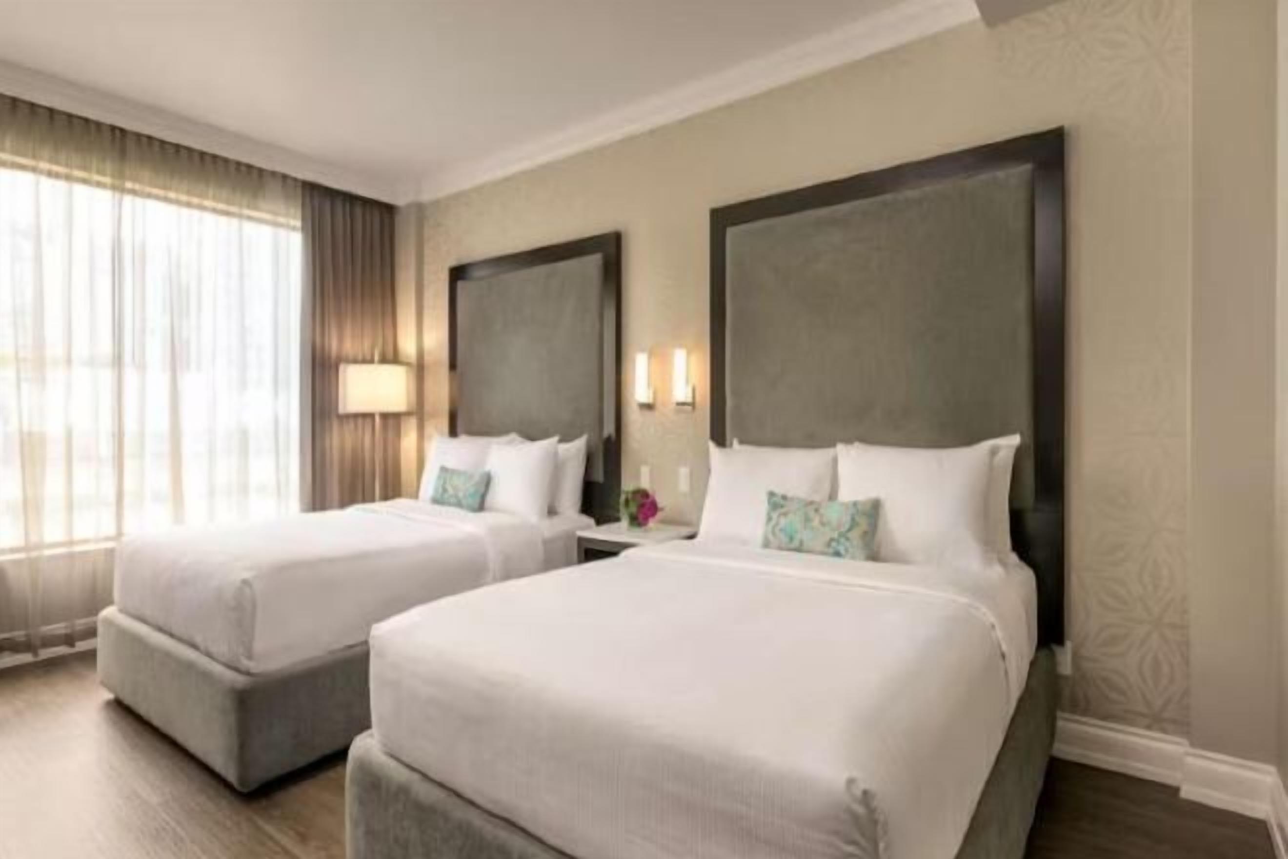 Premium bedding, pillow-top beds, in-room safe, desk