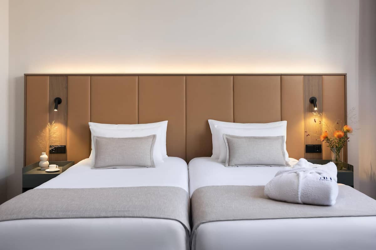 Superior Room (View, New Style) | Minibar, in-room safe, blackout drapes, soundproofing