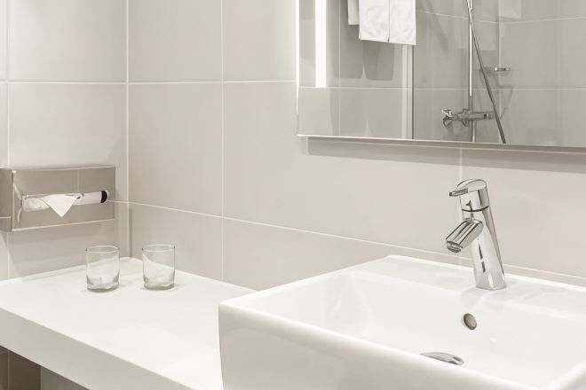 Bathroom | Shower, rainfall showerhead, eco-friendly toiletries, hair dryer