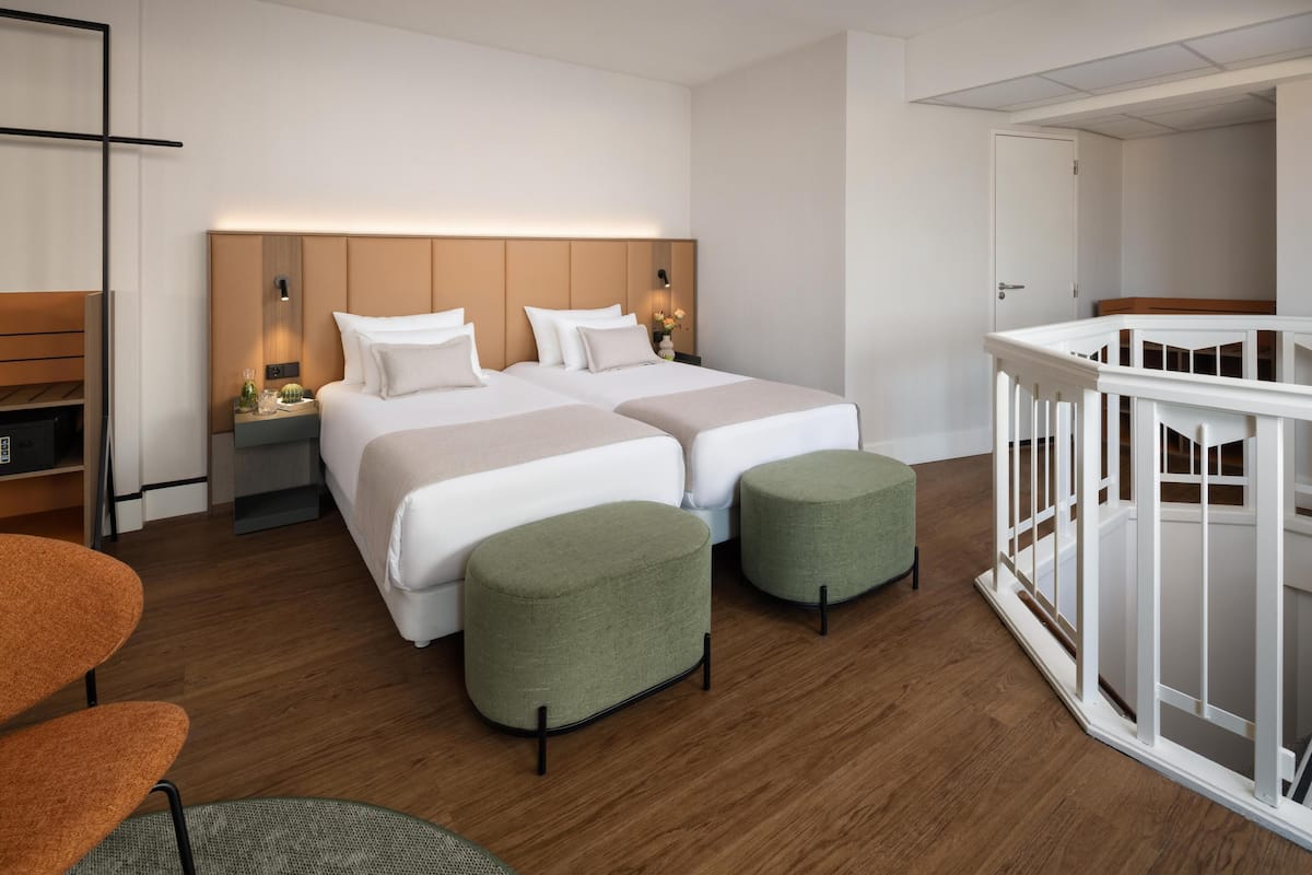 Junior Suite | Minibar, in-room safe, blackout drapes, soundproofing