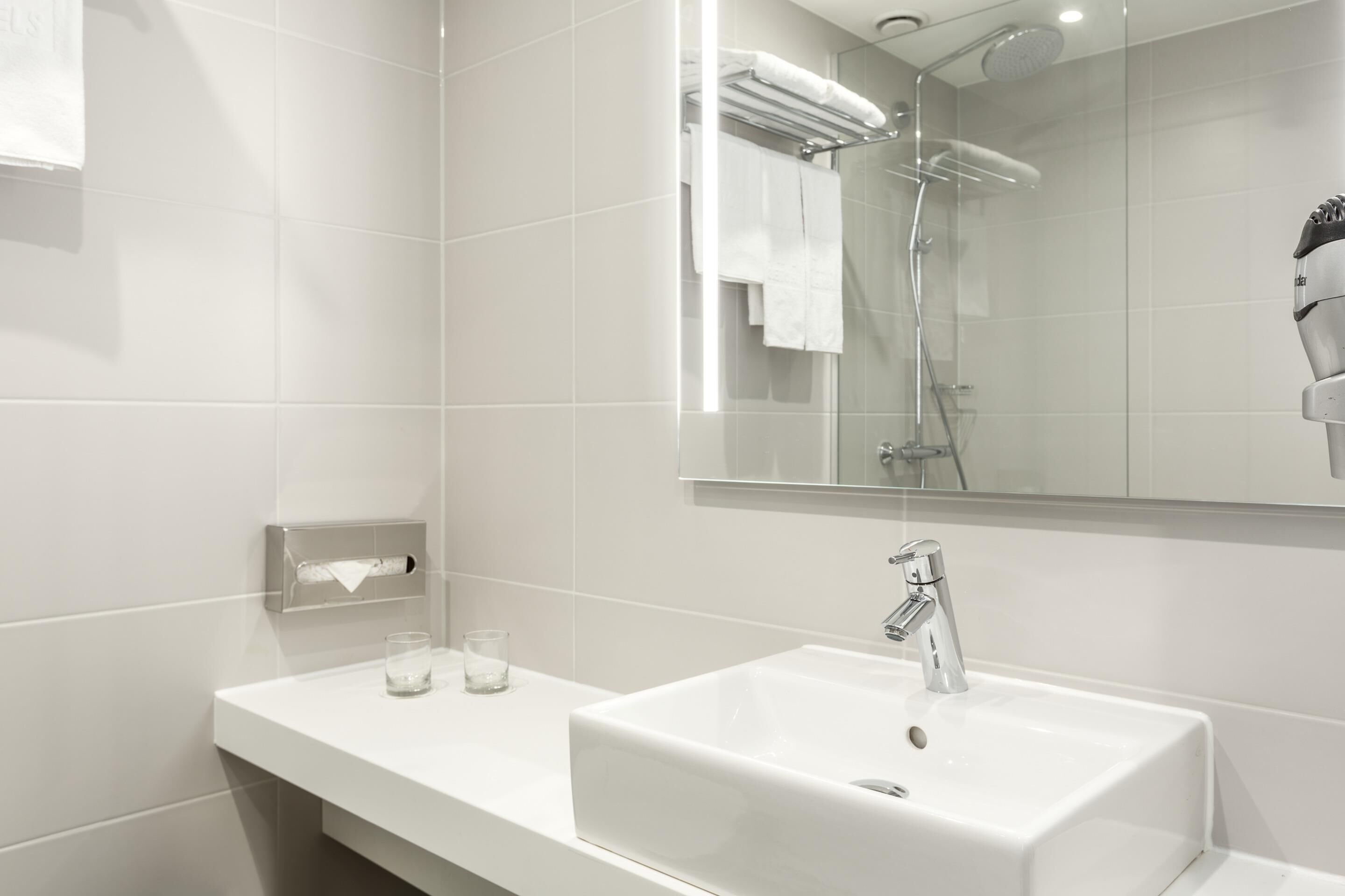 Shower, rainfall showerhead, eco-friendly toiletries, hair dryer
