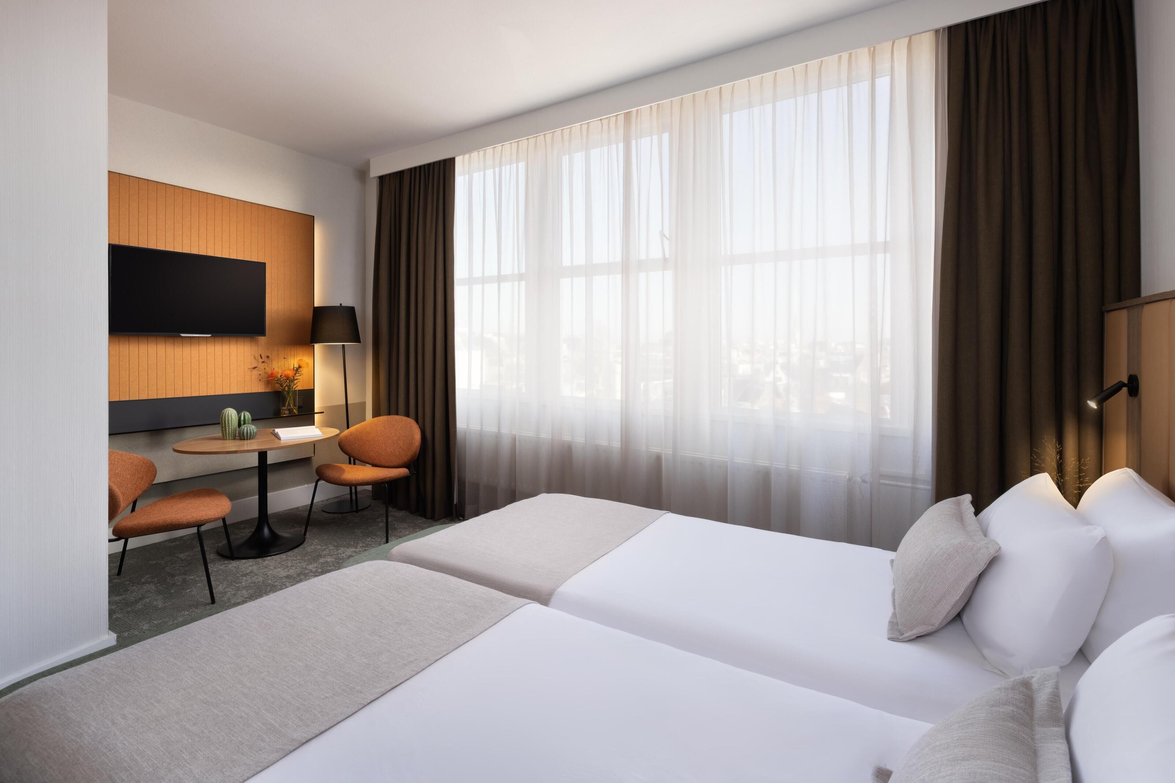 Standard Room (New Style) | Minibar, in-room safe, blackout drapes, soundproofing