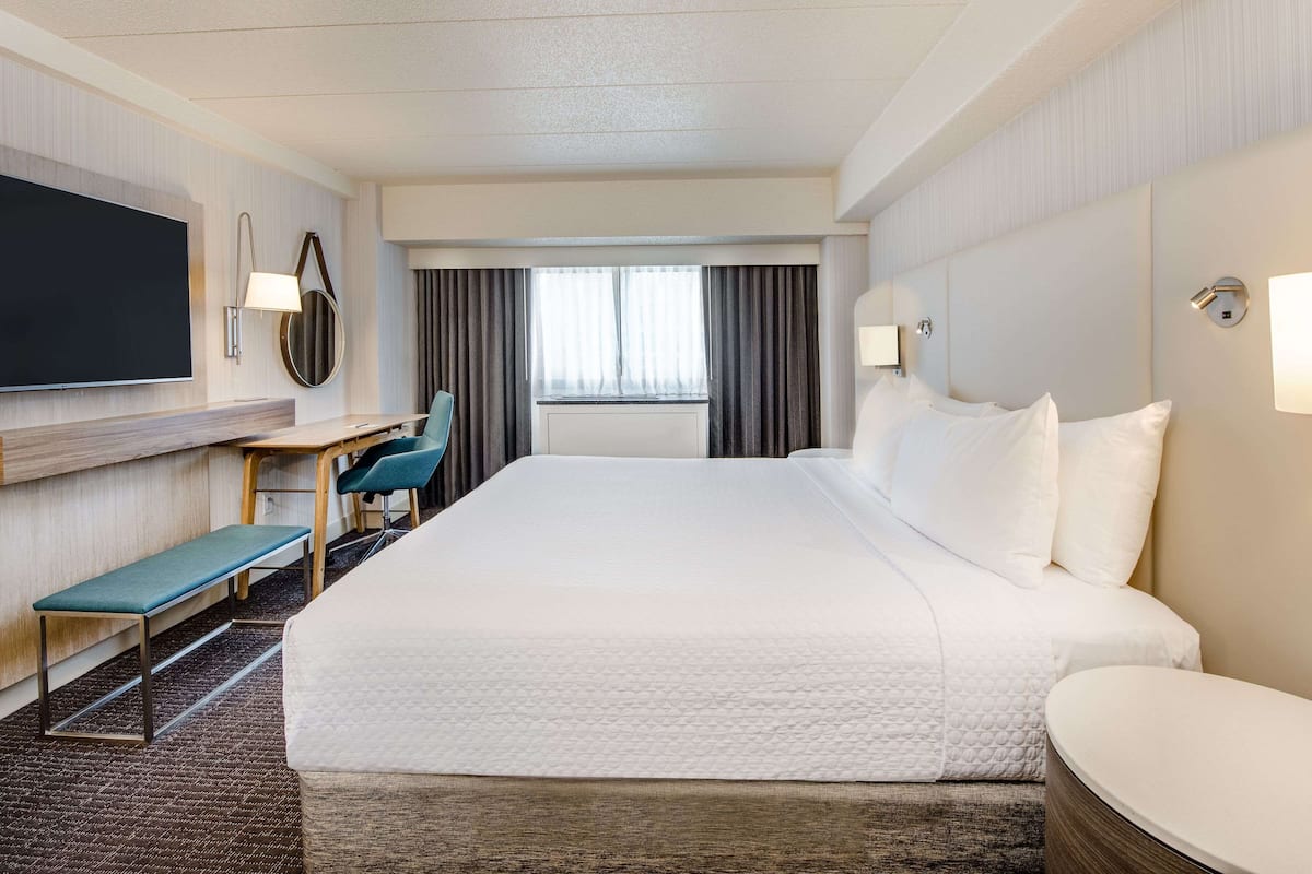 Svit Executive - 1 kingsize-säng (One Bedroom Champion Suite King) | Sängtillbehör av högsta kvalitet och bäddmadrasser