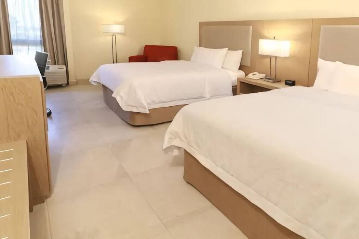 Premium bedding, minibar, iron/ironing board, cribs (free)