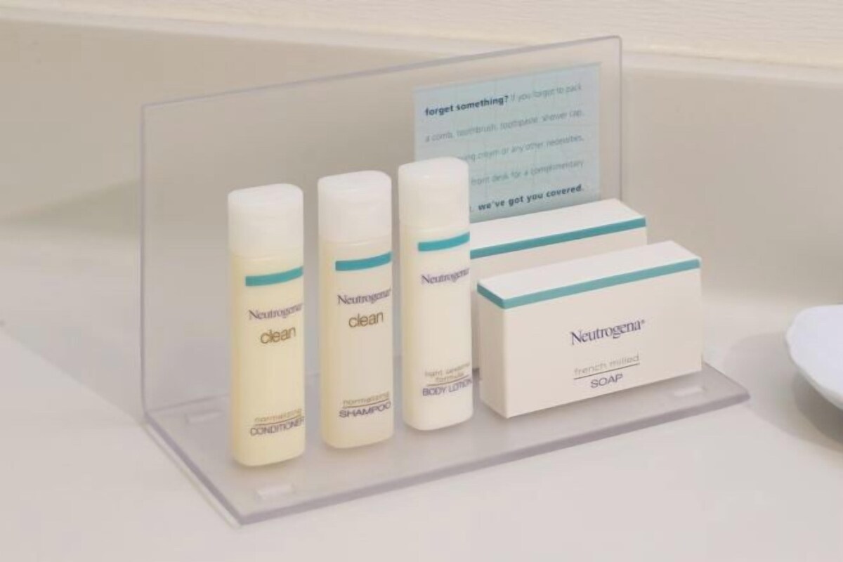 A display of Neutrogena products including body lotion, shampoo, and soap.