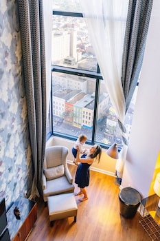 Suite, 2 Bedrooms, Non Smoking, City View (Corner) | 1 bedroom, in-room safe, desk, iron/ironing board at JW Marriott New Orleans