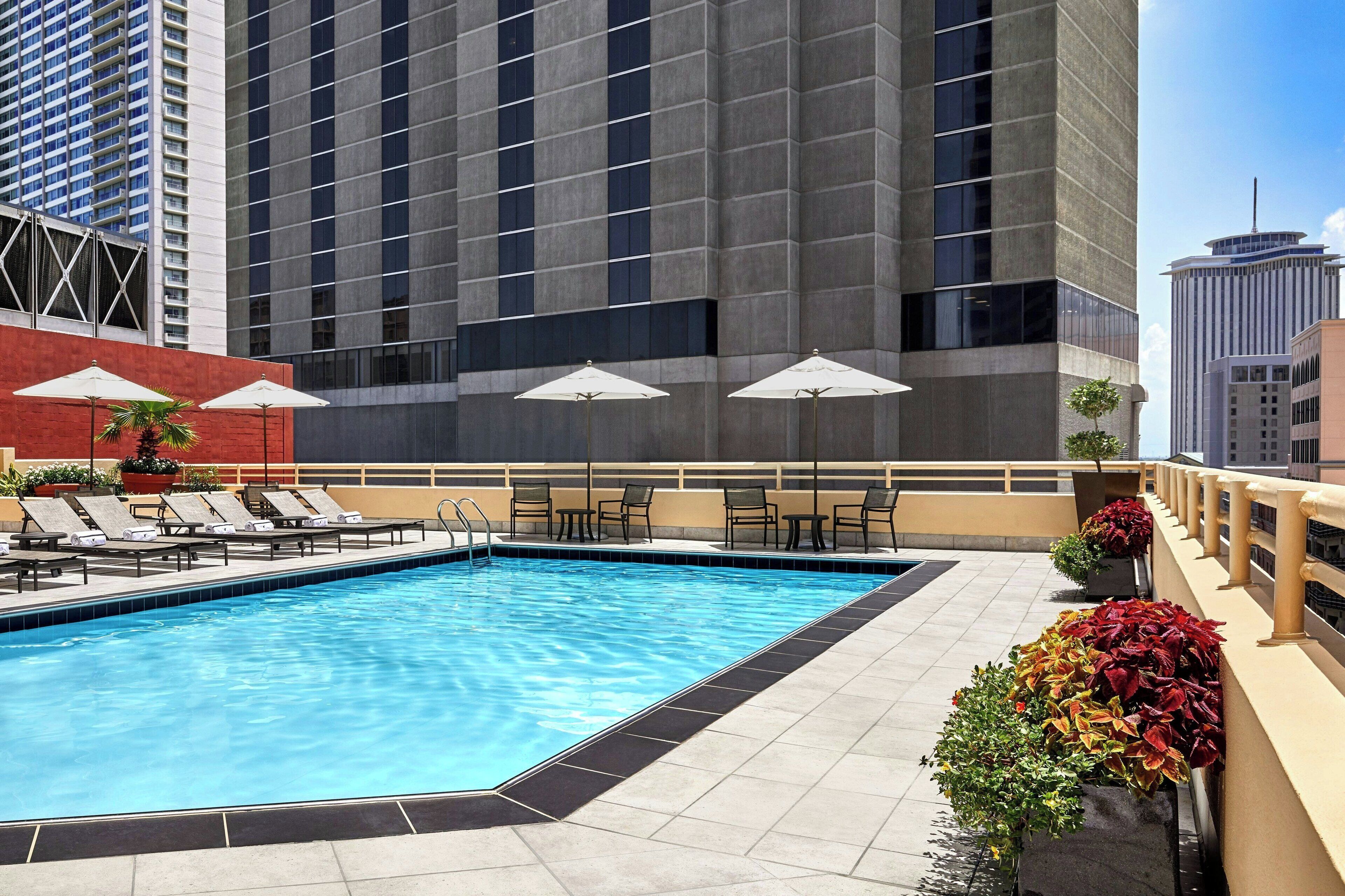 outdoor pool, pool umbrellas, pool loungers